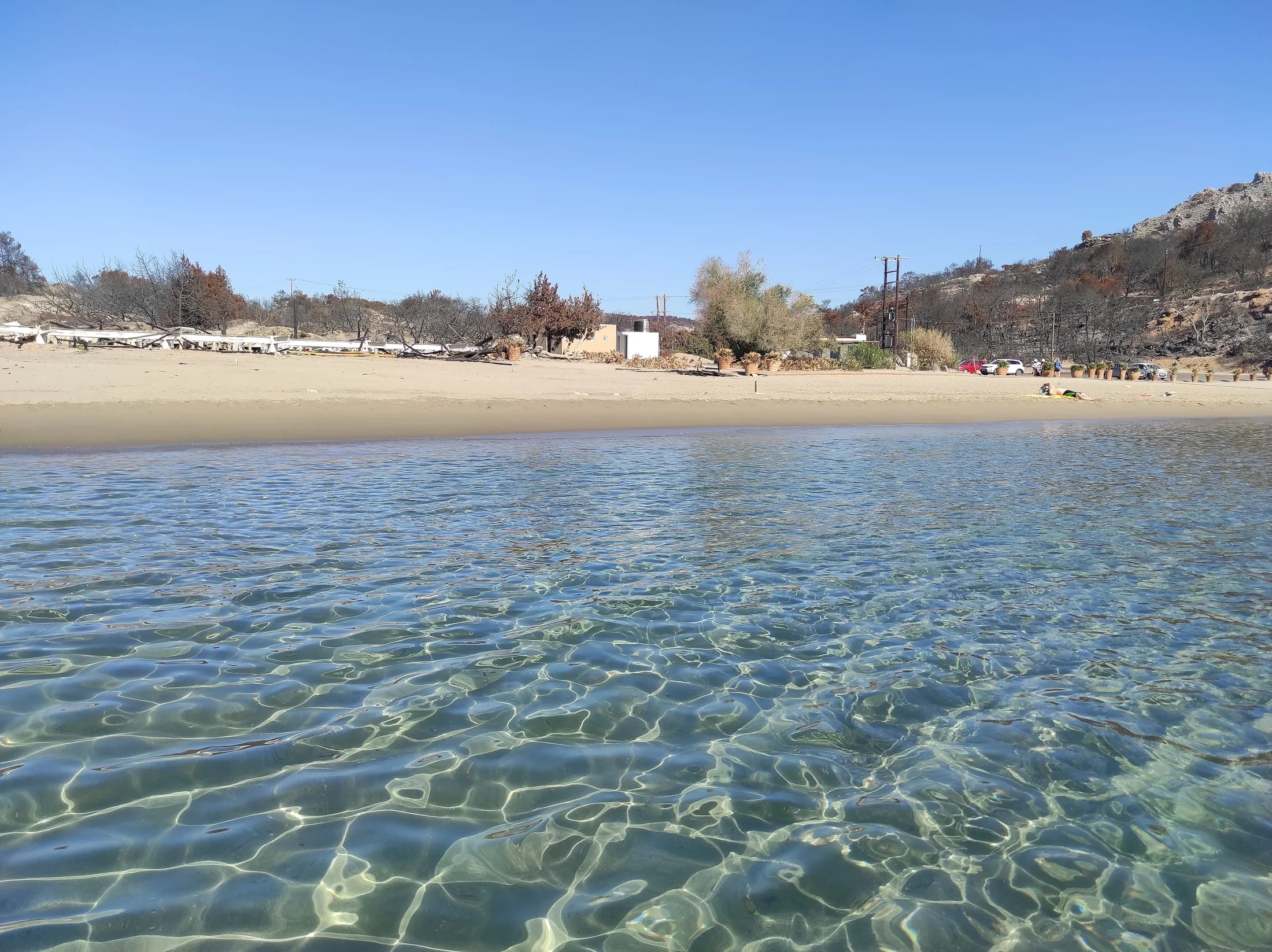 The sandy curve of Glystra Beach
